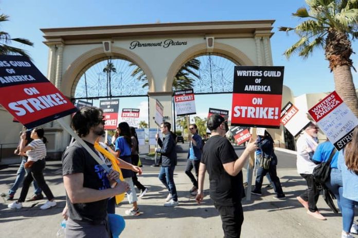 Union to brief Hollywood writers as strike disrupts TV production