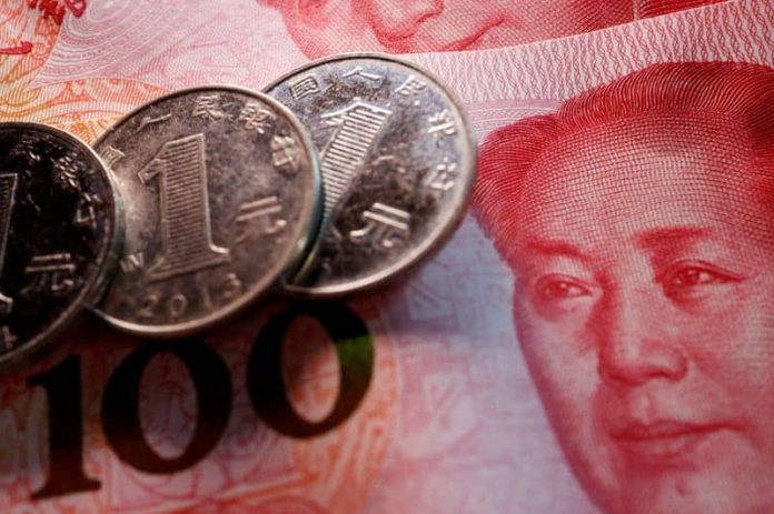 China state banks seen selling US dollars to prop up yuan sources
