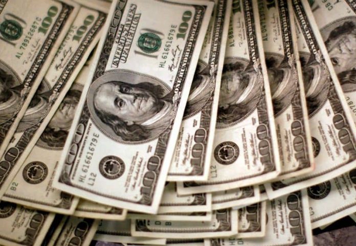 Dollar hovers near 15 month low, euro scales 17 month peak