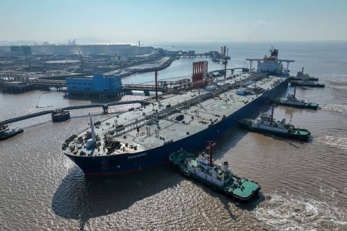 Oil retreats on U.S. demand worries despite China stimulus, supply