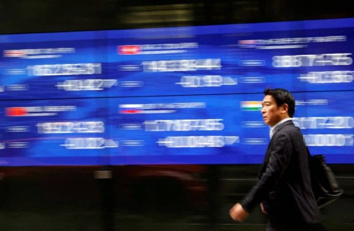 World stocks near 15 month high; China data weighs on markets