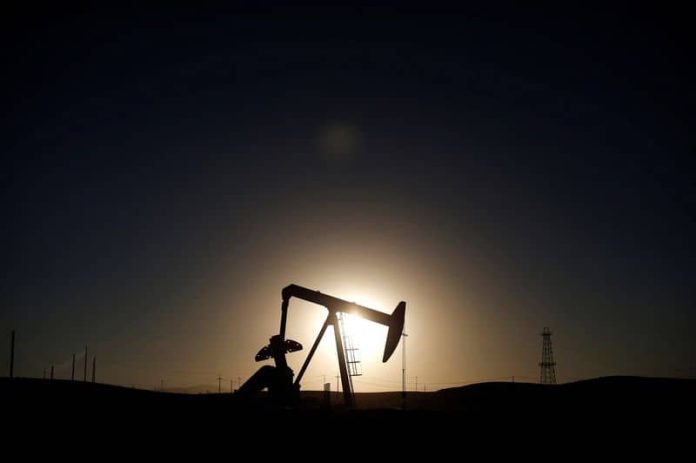 Oil rises on large US stockpile draw, hurricane jitters